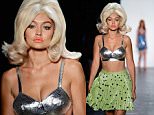 NEW YORK, NY - SEPTEMBER 14:  Model Gigi Hadid walks the runway wearing Jeremy Scott Spring 2016 during New York Fashion Week: The Shows at The Arc, Skylight at Moynihan Station on September 14, 2015 in New York City.  (Photo by Frazer Harrison/Getty Images for NYFW: The Shows)
